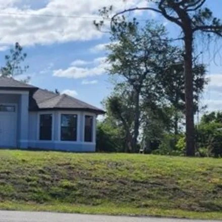 Buy this 3 bed house on 1099 East 5th Street in Lehigh Acres, FL 33972