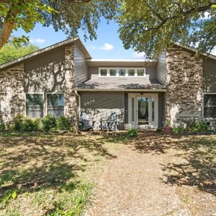 Rent this 4 bed house on 2814 Cheshire Circle in Carrollton, TX 75007