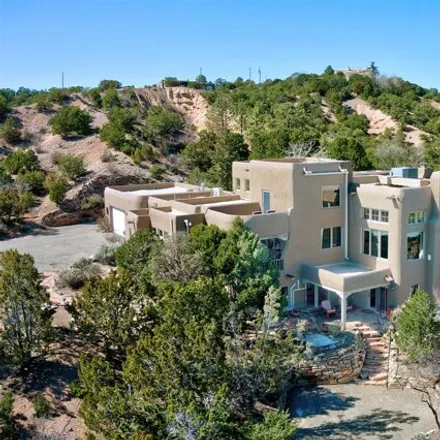 Buy this 4 bed house on unnamed road in Santa Fe, NM 87501