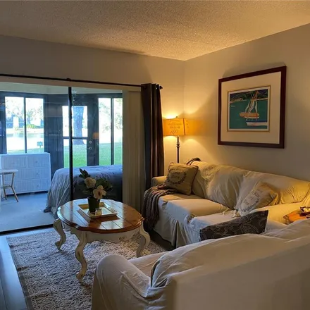 Rent this 2 bed apartment on 250 Woodlake Wynde in Palm Harbor, FL 34677