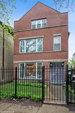 Rent this 4 bed house on 1636 N Leavitt St in Chicago, Illinois