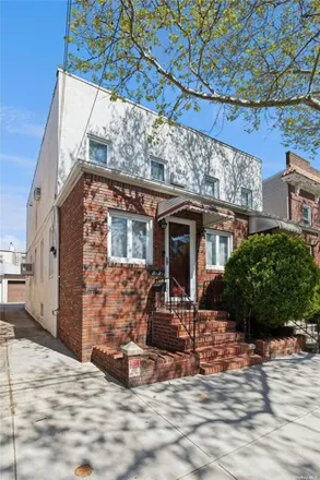 Buy this 3 bed house on 70-29 69th Street in New York, NY 11385