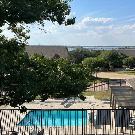Rent this 3 bed condo on 1520 Signal Ridge Place in Rockwall, TX 75032