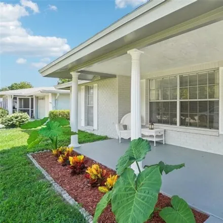 Buy this 3 bed house on 7718 Cherrytree Ln in New Port Richey, Florida