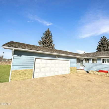 Buy this 4 bed house on 3422 1st Avenue West in Williston, ND 58801