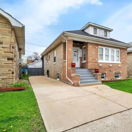 Buy this 4 bed house on 5325 West Addison Street in Chicago, IL 60641