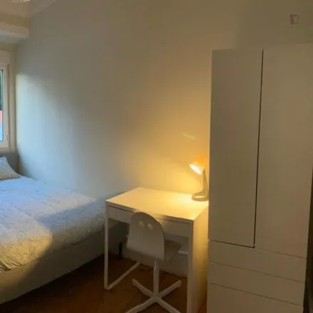 Rent this 2 bed room on Rua de Cabo Verde 4 in 1170-375 Lisbon, Portugal