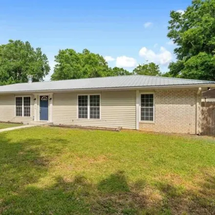 Buy this 5 bed house on 4274 Lois Drive in Pace, FL 32571