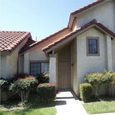 Rent this 2 bed townhouse on 10876 Loro Verde Ave