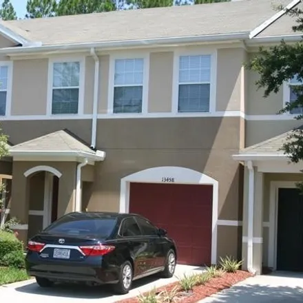 Rent this 3 bed townhouse on 13458 Ocean Mist Drive in Jacksonville, FL 32258