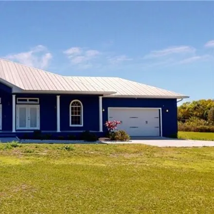 Buy this 4 bed house on 6176 Bowling Road in Lee County, FL 33917