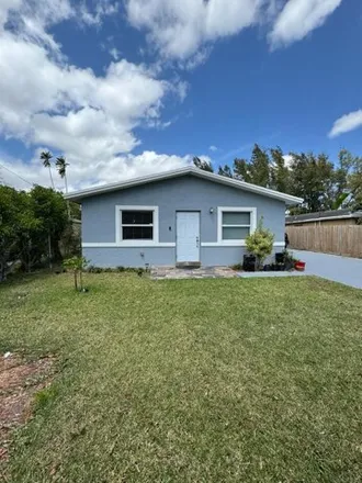 Buy this 3 bed house on 2799 Northwest 26th Street in Flamingo Village, Fort Lauderdale