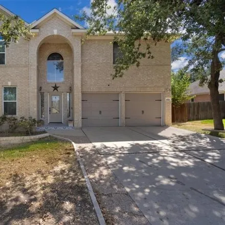 Buy this 4 bed house on 1698 Muledeer Run in Leander, TX 78641