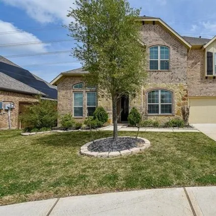 Buy this 4 bed house on 7601 Trailing Oaks Drive in Harris County, TX 77379