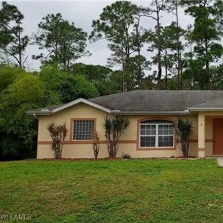 Rent this 4 bed house on 2009 Sable Ct in Lehigh Acres, Florida