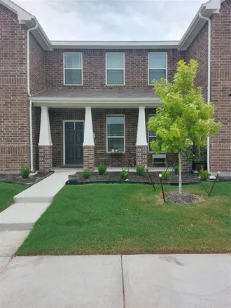 Rent this 3 bed townhouse on 135 Redbud Drive in Forney, TX 75126