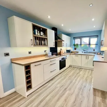 Buy this 4 bed house on Kilcoby Avenue in Pendlebury, M27 8AT