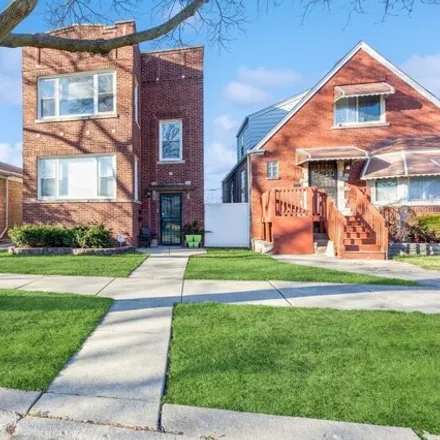 Buy this 4 bed house on 554 East 103rd Place in Chicago, IL 60628
