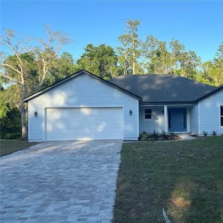 Rent this 4 bed house on 3940 Hickory Tree Road in Osceola County, FL 34772