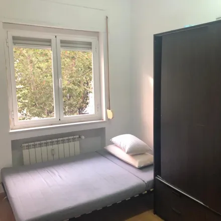 Rent this 2 bed apartment on Madrid in El Jardín Secreto, Calle del Conde Duque