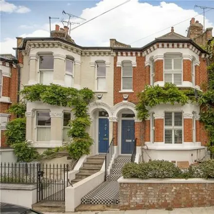 Buy this 4 bed townhouse on Bucharest Road in London, SW18 3AR