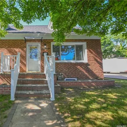 Buy this 4 bed house on 18 Hoffman Ave in Elmont, New York