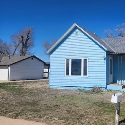 Buy this 2 bed house on 225 West 14th Street in Cozad, NE 69130