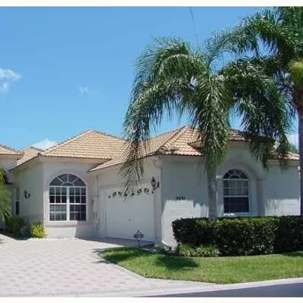 Rent this 3 bed house on 9061 Long Lake Palm Dr in Boca Raton, Florida