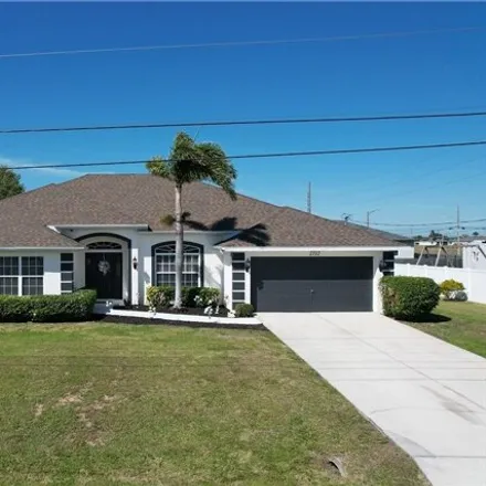 Buy this 4 bed house on 2712 Ne 1st Ave in Cape Coral, Florida