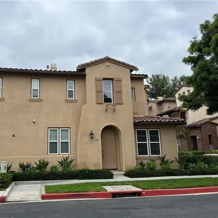 Rent this 3 bed condo on 139 Tall Oak in Irvine, California