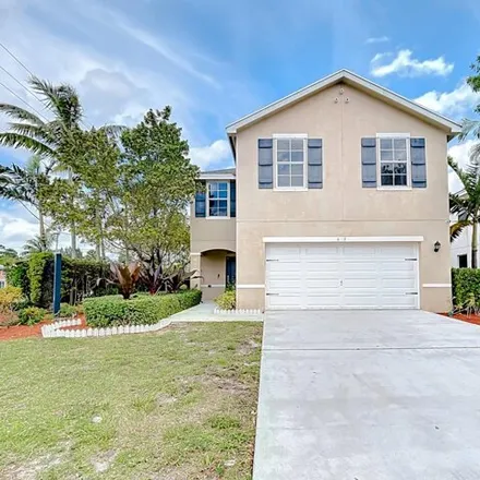 Rent this 4 bed house on 4909 Haverhill Pointe Drive in Haverhill, Palm Beach County