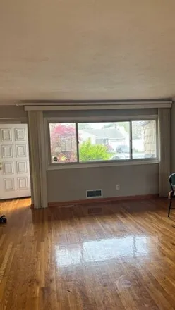 Rent this 3 bed house on 82 Dartmouth Drive in Hicksville, NY 11801