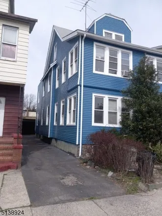 Buy this 7 bed townhouse on 265 Columbia Avenue in Irvington, NJ 07111