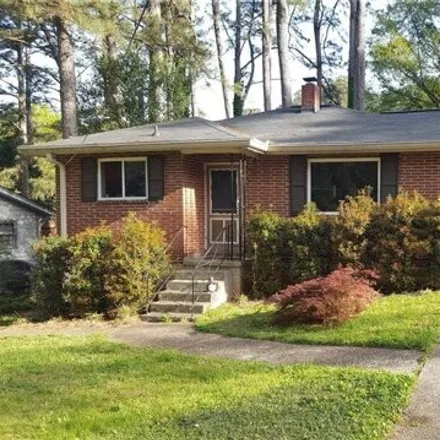 Rent this 3 bed house on 2944 Lowrance Drive in Scottdale, GA 30033
