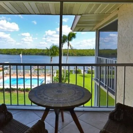 Rent this 2 bed condo on 307 Goodlette-frank Rd S Apt 506b in Naples, Florida