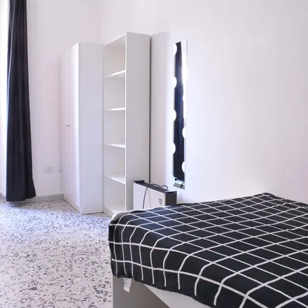 Rent this 6 bed room on Via dei Giudicati 3 in 09131 Cagliari Casteddu/Cagliari, Italy