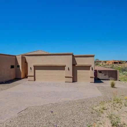 Buy this 4 bed house on 13362 South Rockhouse Canyon Trail in Mountain View, Pima County