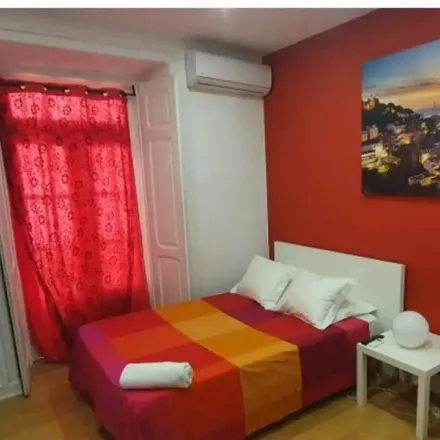 Rent this 8 bed room on Rua Francisco Sanches 67 in 1170-141 Lisbon, Portugal