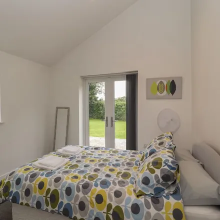 Rent this 2 bed townhouse on Llanfair-Mathafarn-Eithaf in LL76 8SQ, United Kingdom