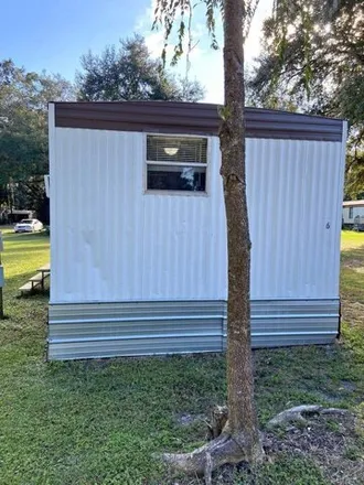 Buy this studio apartment on 3563 Northwest Gainesville Road in Marion County, FL 34475