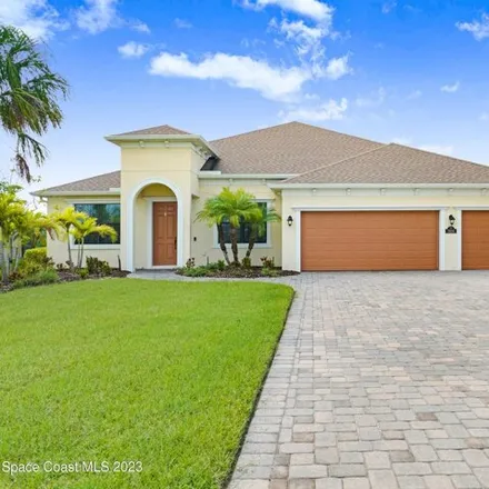 Buy this 4 bed house on 7392 Millbrook Avenue in Viera, FL 32940