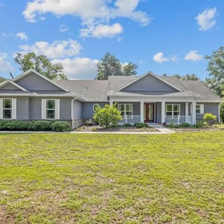 Buy this 4 bed house on 225 Northwest Joe Lowe Court in Lake City, FL 32055