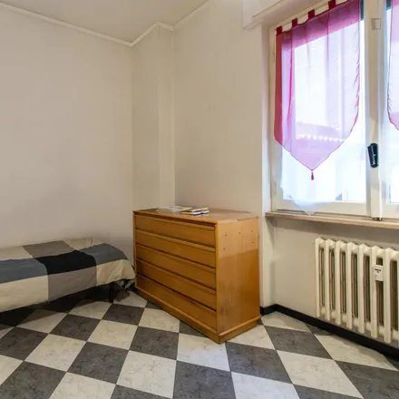 Rent this 3 bed room on Via Arcivescovo Romilli in 28, 20139 Milan MI