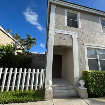 Rent this 3 bed townhouse on 10544 Northwest 57th Court in Kensington Manor, Coral Springs