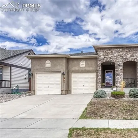 Buy this 5 bed house on 7786 Chasewood Loop in Colorado Springs, CO 80908
