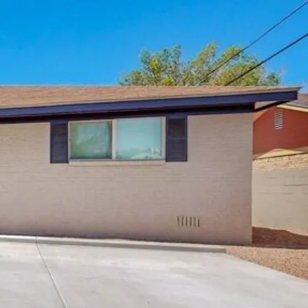 Buy this 3 bed house on 6387 Claremont Avenue Northeast in Albuquerque, NM 87110