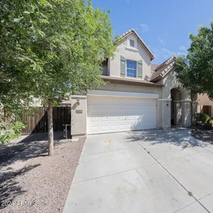 Rent this 4 bed house on East Vermont Court in Gilbert, AZ 85295