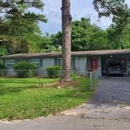 Rent this 3 bed house on 1461 Southeast 42nd Place in Robinson Heights, Alachua County