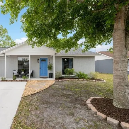 Buy this 3 bed house on 7942 Avenal Loop in New Port Richey, Florida