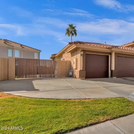 Buy this 4 bed house on 1413 West Commerce Avenue in Gilbert, AZ 85233